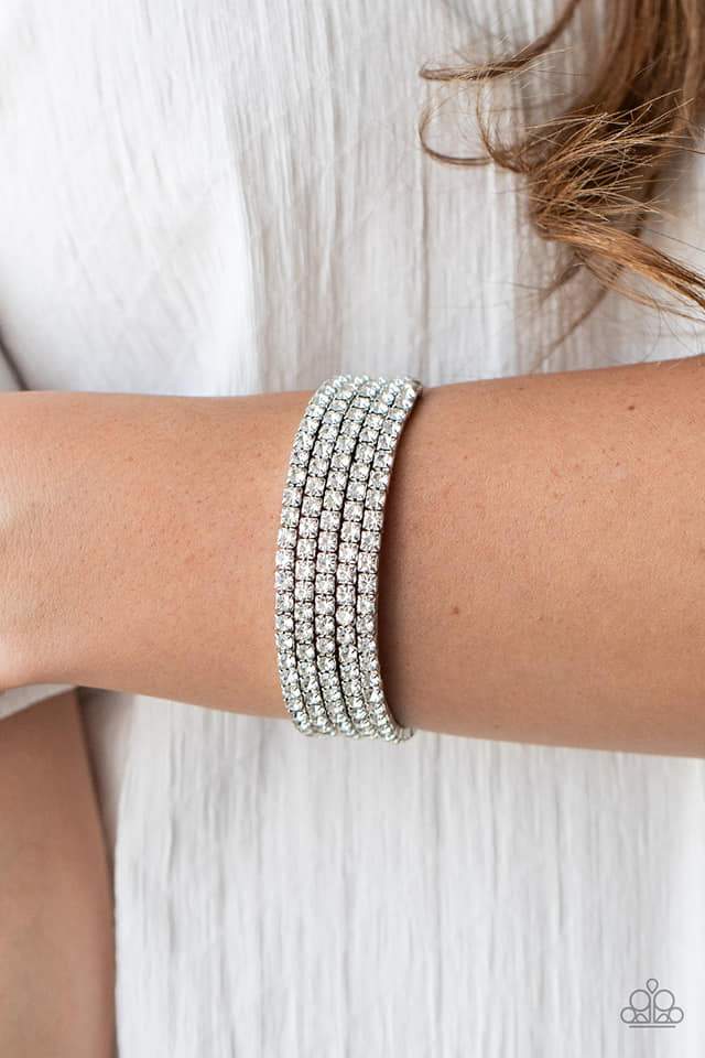 The Glow Digger White Rhinestone Coil Bracelet February 2021 Life of The Party Paparazzi Accessories - GlaMarous Titi Jewels