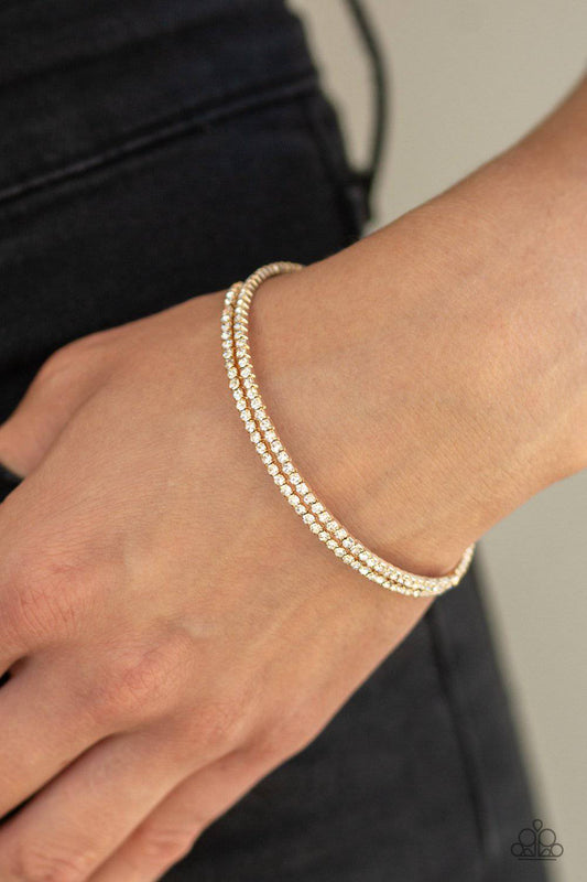 Sleek Sparkle - Gold Rhinestone Bracelet - Paparazzi Accessories - GlaMarous Titi Jewels