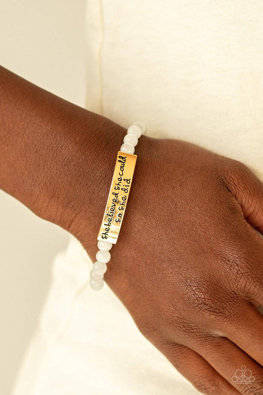 So She Did - Gold Stretchy Bracelet - Paparazzi Accessories - GlaMarous Titi Jewels