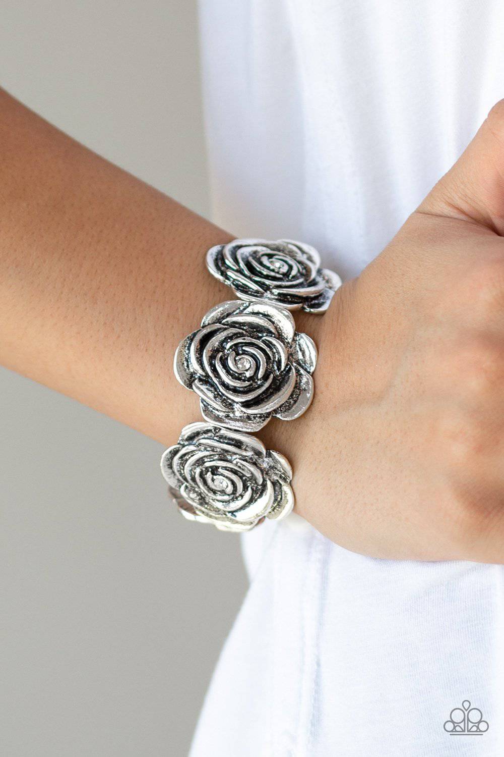 Floral Flamboyancy White Bracelet - Paparazzi Accessories - GlaMarous Titi Jewels