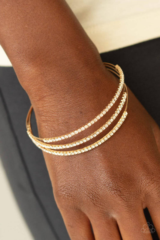 Iridescently Infatuated Gold & White Rhinestone Cuff Bracelet - Paparazzi Accessories - GlaMarous Titi Jewels