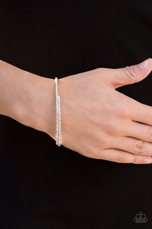 Sleek Sparkle - White Rhinestone Bracelet - Paparazzi Accessories - GlaMarous Titi Jewels