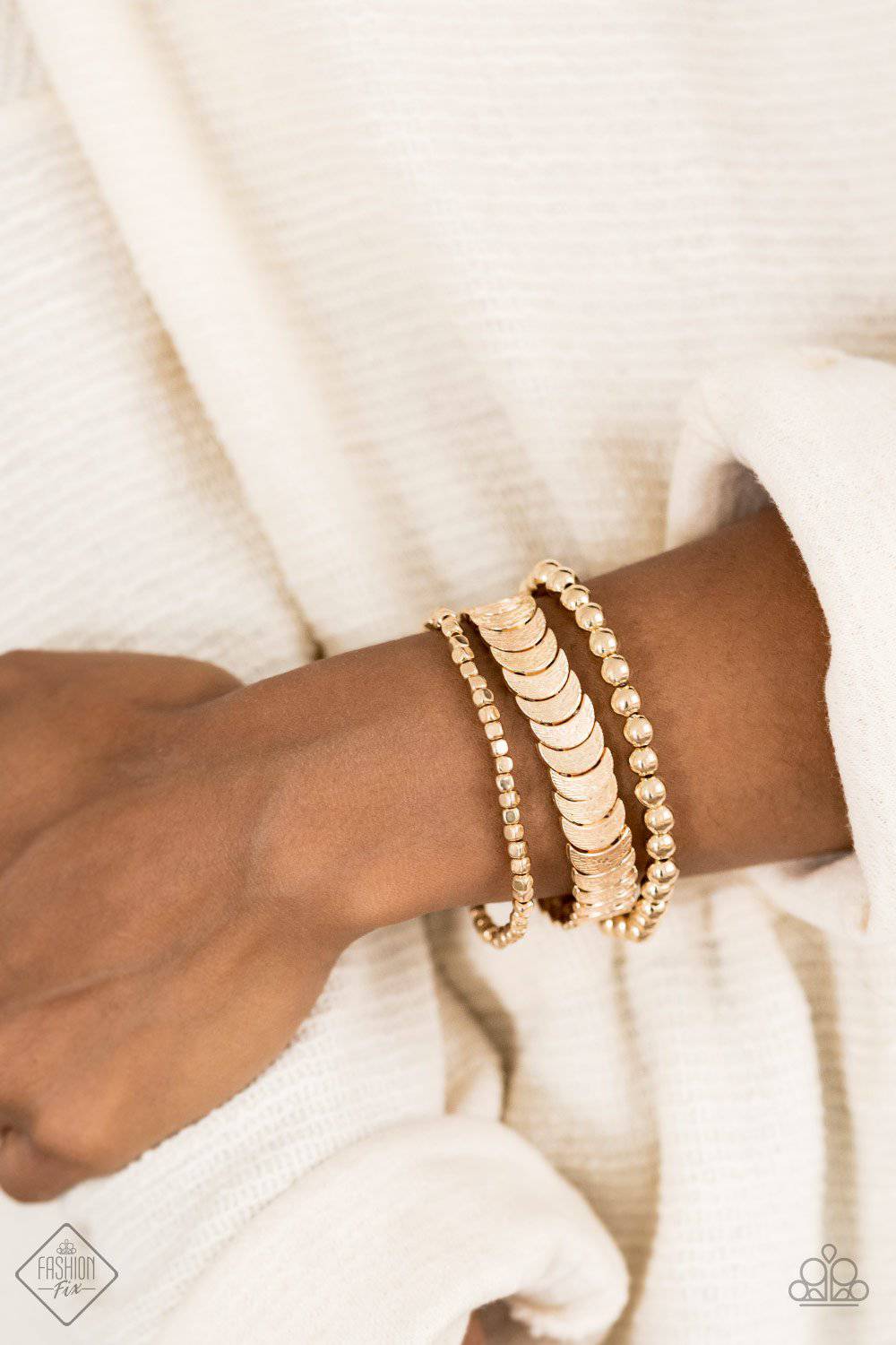 LAYER It On Me - Gold Half-Moon Shaped Stretchy Bracelets - Paparazzi Accessories - GlaMarous Titi Jewels