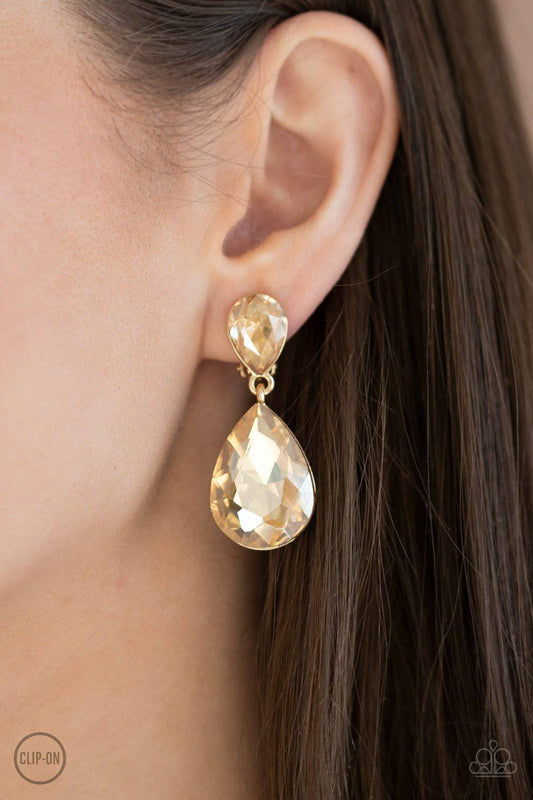 Aim For The MEGASTARS - Gold Rhinestone Teardrop Clip-On - Paparazzi GlaMarous - GlaMarous Titi Jewels
