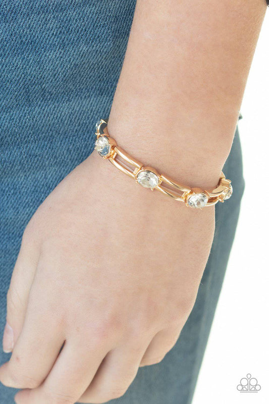 FLASH or Credit? - Gold Rhinestone Stretchy Bracelet -Paparazzi Accessories - GlaMarous Titi Jewels