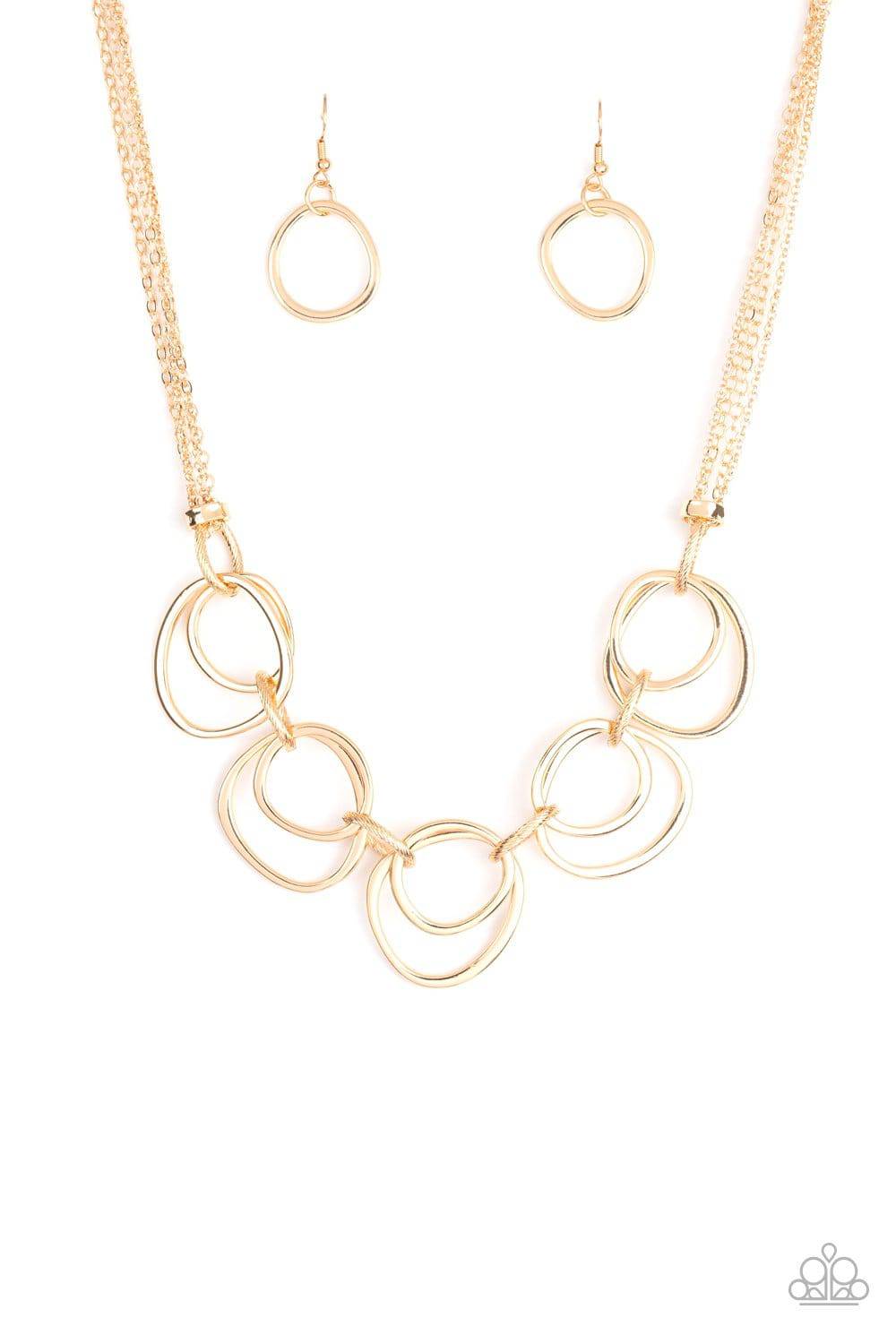 Asymmetrical Adornment - Gold Rings Necklace - Paparazzi Accessories - GlaMarous Titi Jewels