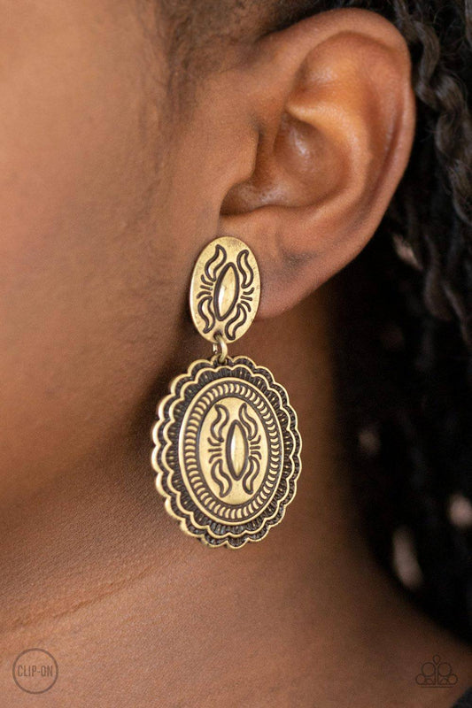 Ageless Artifact - Brass Clip-On Earrings - Paparazzi Accessories - GlaMarous Titi Jewels