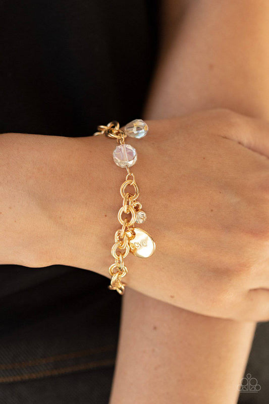 Lovable Luster - Gold and Rhinestone Bracelet - Paparazzi Accessories - GlaMarous Titi Jewels