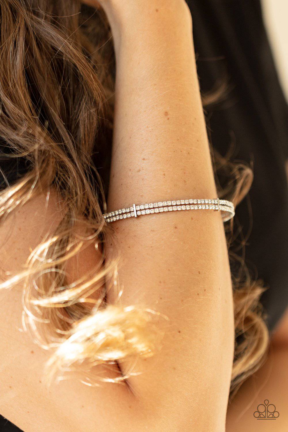 Standout Opulence - White Rhinestone Bracelet - Paparazzi Accessories - GlaMarous Titi Jewels