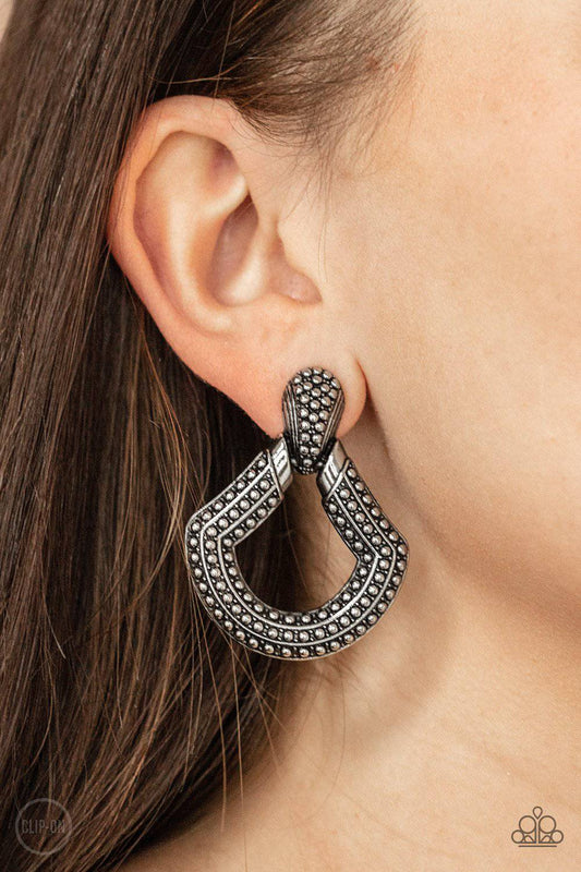 Better Buckle Up - Silver Clip-on Earrings - Paparazzi Accessories - GlaMarous Titi Jewels