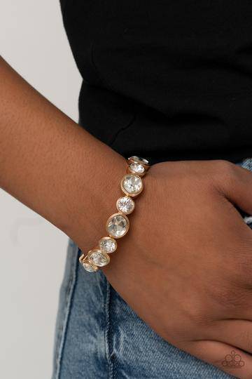Still GLOWING Strong - Gold Rhinestone Stretchy Bracelet - Paparazzi Accessories - GlaMarous Titi Jewels